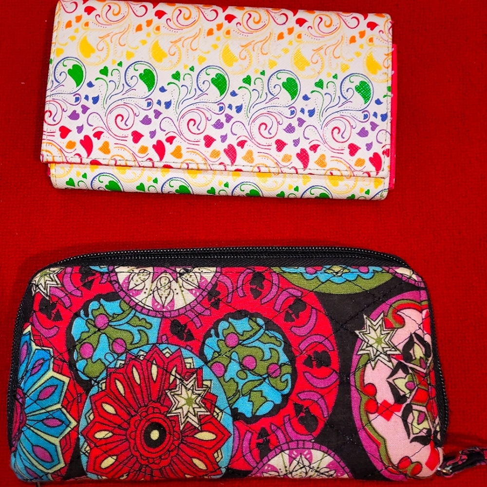 2 different women's wallets